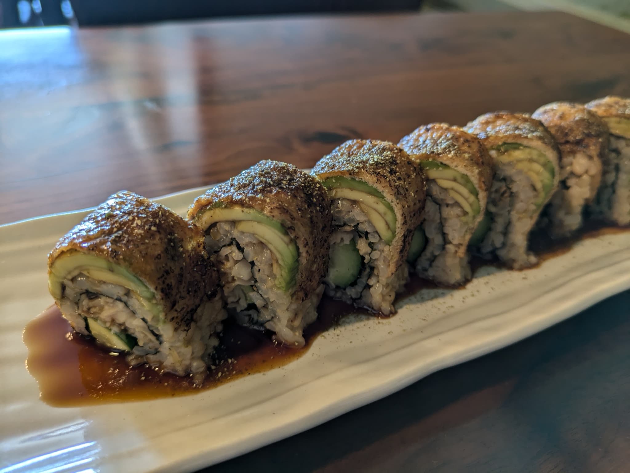 Shojin, Los Angeles: a vegan sushi roll with avocado on a white plate, served at Shojin, described by the uploader as veg